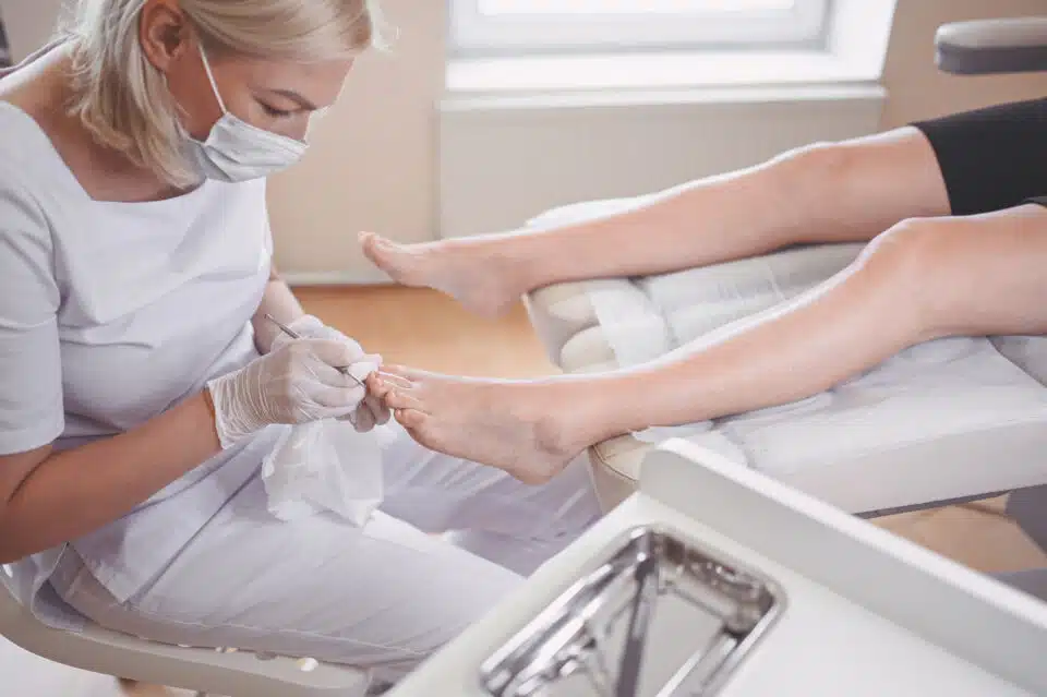 Foot care specialist performing Medical pedicure