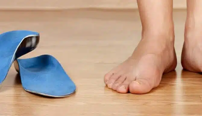 Custom Orthotics Next To A Person Standing