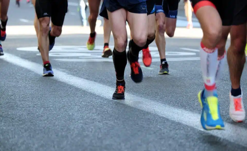 Close up of runner's shoes and feet during a road race