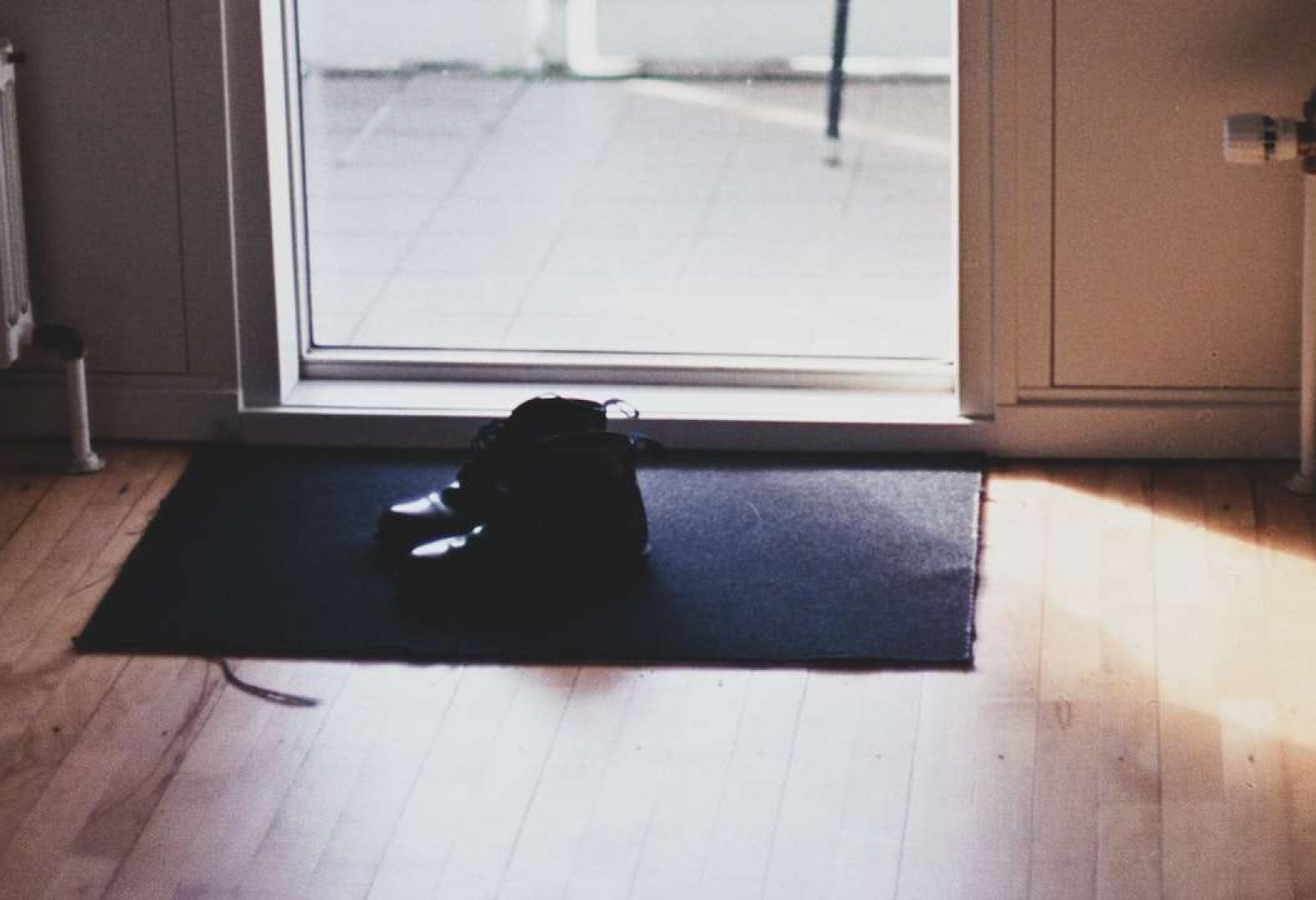Indoor Shoes at the doorstep of a home