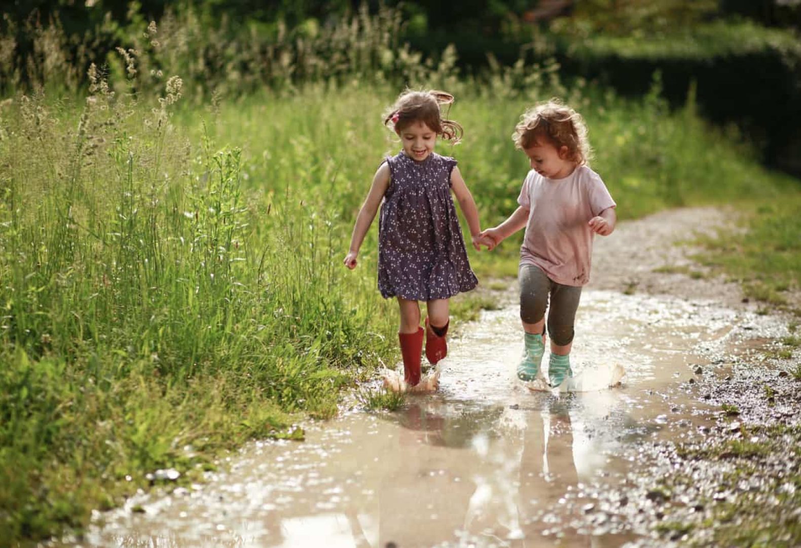 Girls playing in mud
