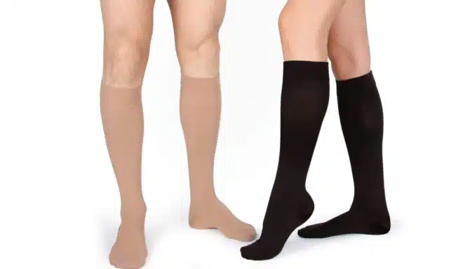 Nude and black compression stockings in knee-high type