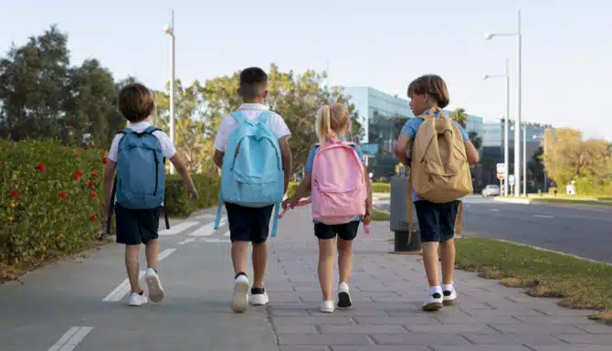 A group of kids walking to school first day of the year
